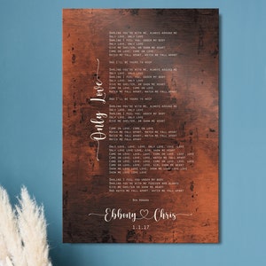 May include: A rustic wooden background with a white text overlay of a song lyric about love. The text includes the lyrics "Only Love" and "Watch me fall apart". The text also includes the names "Ebbony" and "Chris" with a heart symbol and the date "1.1.17".