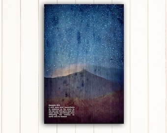 May include: A dark blue and purple mountain range with a starry night sky above. The text "Genesis 26:4 I will make your descendants as numerous as the stars in the sky and will give them all these lands, and through your offspring all nations on earth will be blessed" is written in white.