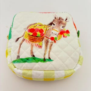 Handmade, small cotton fabric zipper pouch, Heather Ross by Hand fabric, quilted and lined.