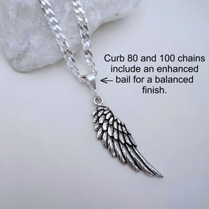 May include: Silver chain necklace with a detailed silver angel wing pendant. Curb 80 and 100 chains include an enhanced bail for a balanced finish.