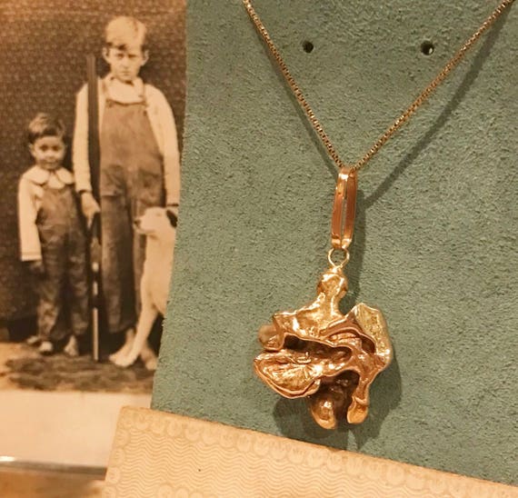 large gold nugget pendant