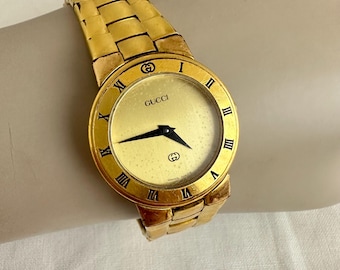 1990's Ladies GUCCI 3300L gold dial wristwatch