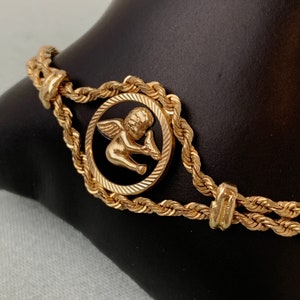 14K Yellow Gold Cherub Black Onyx Rope Bracelet, Vintage 14k gold onyx medallion bracelet, 10.5g