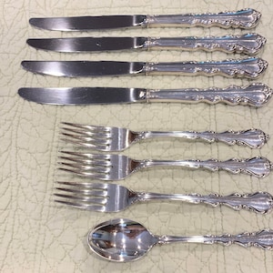 Angelique pattern by International Silver Co. flatware 8 piece partial set, 4 knives, 3 forks, & 1 spoon, 473.5 Grams