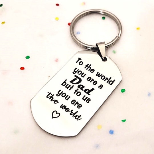 Disover Father day gift from Daughter | To the world you are a Dad but to us you are the World Keychain