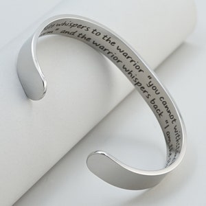 Encouragement Bracelet Fate whispers to the warrior you cannot withstand the storm the warrior whispers back I am the storm Cuff Bangle image 2