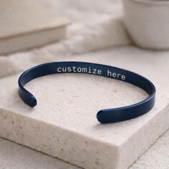 Unique blue bracelet custom engraved with name, quote, message, and Date.