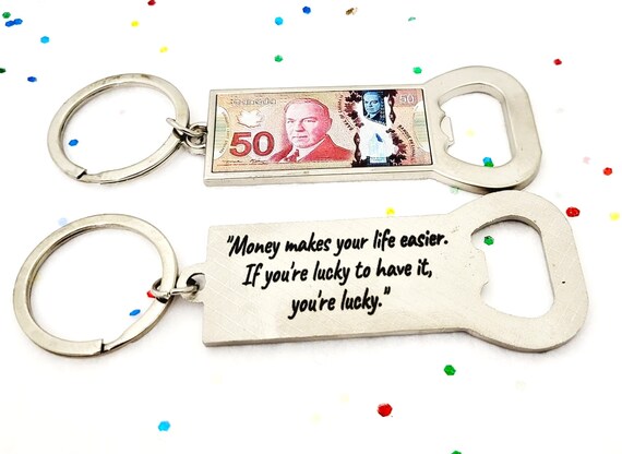 Personalized Canada Souvenir Currency bottle opener Keychain with a Custom Engraved Message on Back.
