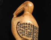 Large folk art woodcarving of fat bird