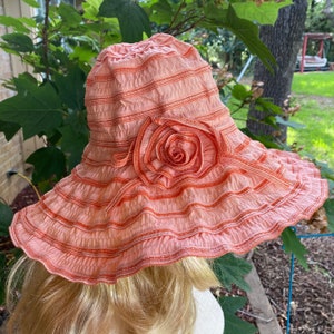 Sun Hat Orange Striped with Cute Orange Flower on Side or Back. Hat is Unique with a Gathered Fabric. Foldable, Perfect for Summer