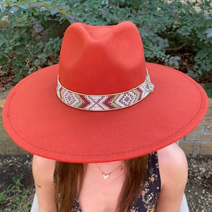 Wide Brim Felt Fedora Hat Beautiful Coral, Orange with a Stunning Jeweled Hat Band of Rhinestones and Beads. This one is a real head turner.