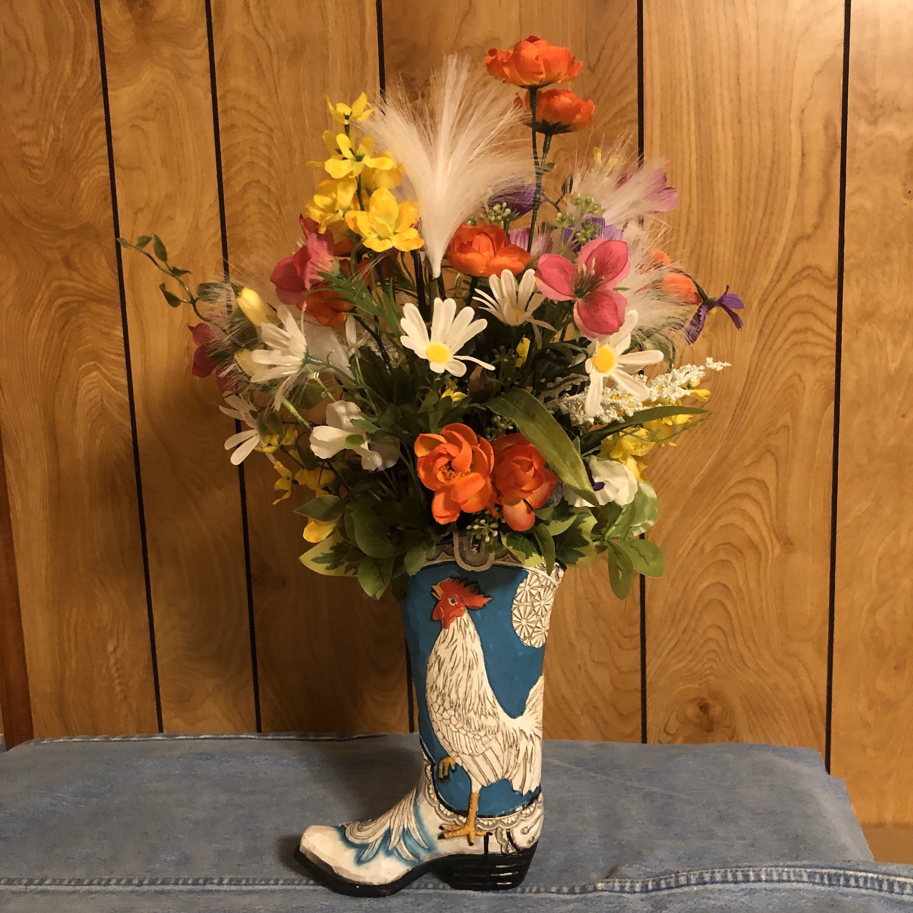 Boot Vase With a Fun Chicken on Side With Blue Sky Background