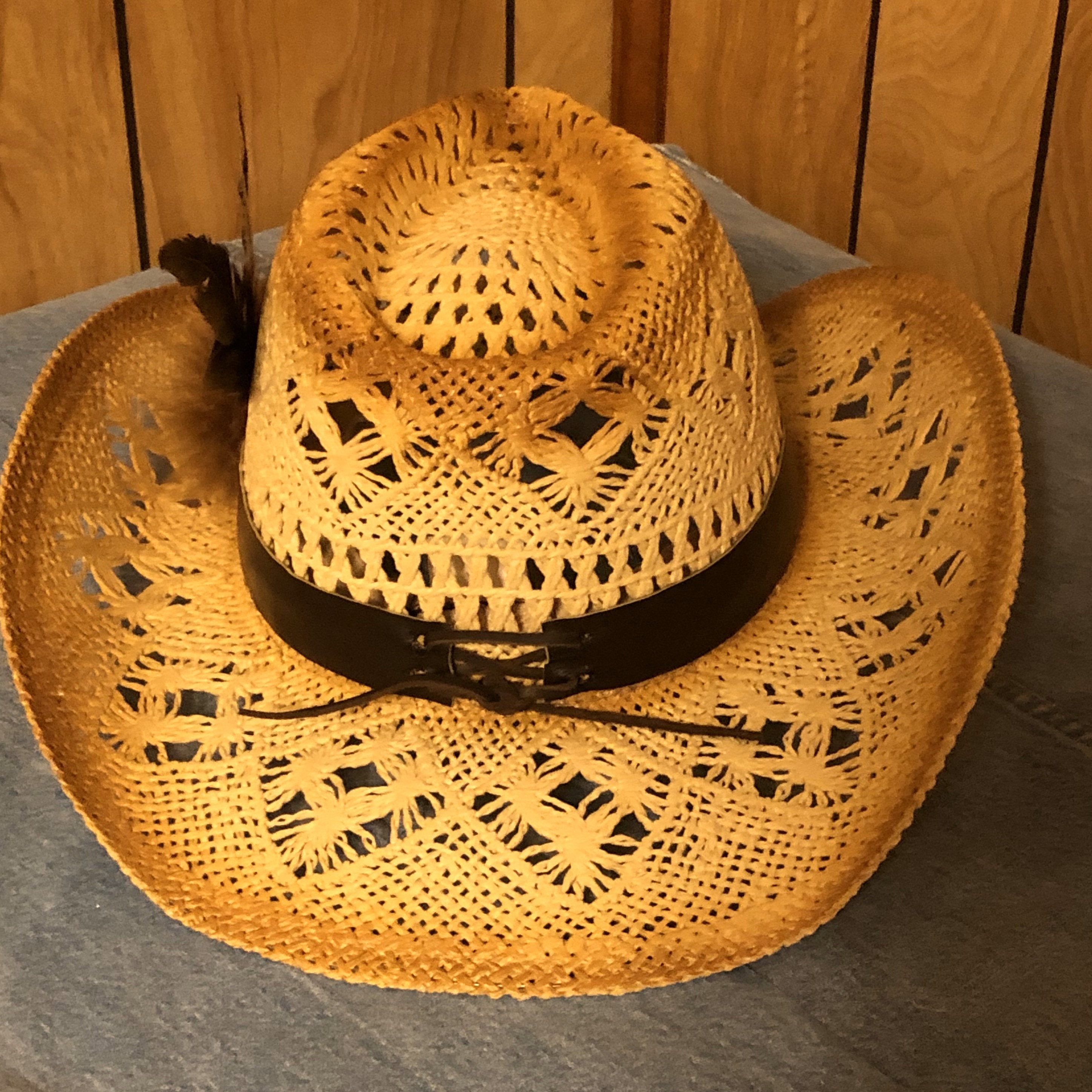 Brown Straw Cowboy Hat Accented With Beautiful Feathers on a  display picture 2