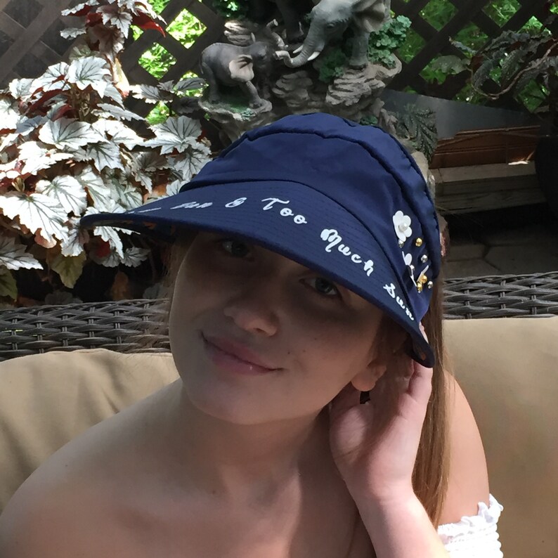 Blue Visor Foldable Hat with Pretty White Flowers Rhinestones and Studs Monogrammed with Messy Bun /& Too Much Sun