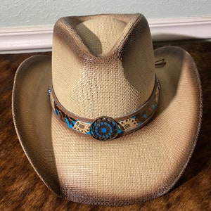 Straw Cowboy Hat, Brown Antiqued Straw with Brown and Blue Tooled Hat Band Stitched in Blue with Gold Medallion with Blue Center