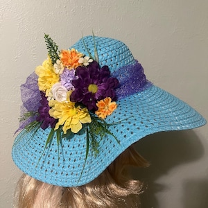 Beautiful Blue Wide Brim Floppy Sun Hat with Shear Ribbon Band and Unique Flower Accents