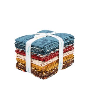 May include: A stack of fabric squares in various colors, including blue, red, yellow, and brown, tied with a white ribbon. The top layer of fabric is a blue print with a design. The ribbon has text printed on it.