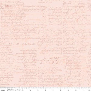 May include: Pink fabric with a repeating pattern of handwritten text in a darker pink color. The fabric is designed for quilting and crafting projects.