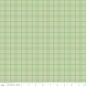May include: A green and white plaid fabric with a repeating pattern. The fabric is 12 inches wide and is perfect for quilting, sewing, and crafting projects.