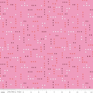 May include: Pink fabric with a repeating pattern of small white, red, and black playing card symbols.
