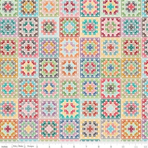 May include: A colorful fabric with a repeating pattern of crocheted squares in various colors, including red, blue, green, yellow, and pink.