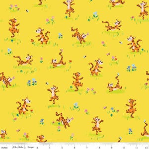 May include: A yellow fabric with a repeating pattern of orange and black tigers in various poses. The tigers are outlined in black and have white stripes. The background is a bright yellow.