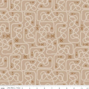 May include: A beige fabric with a white and brown repeating pattern of train tracks and railroad crossing signs. The fabric is 12 inches wide.