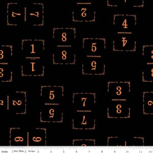 May include: Black fabric with a repeating pattern of orange framed numbers. The numbers are 1, 2, 3, 4, 5, 6, 7, 8, and 9.