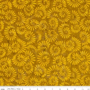 May include: A yellow fabric with a repeating pattern of stylized yellow flowers on a brown background.