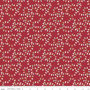 May include: Red fabric with a repeating pattern of white, blue, green, and pink lightbulbs connected by gold string. The lightbulbs are arranged in a curved pattern, resembling a string of Christmas lights.