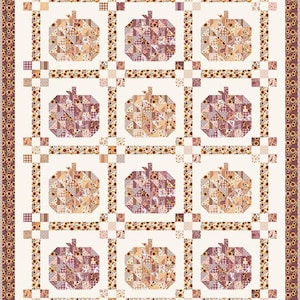 May include: A rectangular quilt featuring a grid of twelve pumpkin blocks in shades of pink, peach, and brown. The pumpkins are constructed from small patchwork squares. The quilt has a border of sunflowers and a cream-colored background.