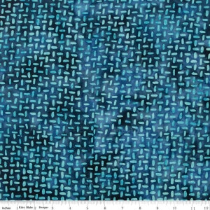 May include: A fabric with a repeating pattern of small, light blue, oval shapes on a dark blue background. The design resembles a woven texture. The fabric is marked with inches along the bottom edge.