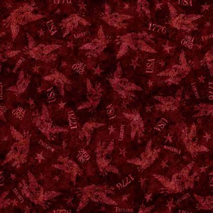 May include: A burgundy fabric with a repeating pattern of eagles, stars, and text. The text includes "USA", "Liberty", "Freedom", "1776", and "250 YRS". The design has a vintage, patriotic theme.