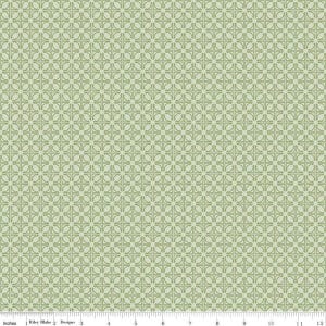 May include: A light green fabric with a repeating geometric pattern. The pattern consists of small, interconnected shapes resembling crosses and rounded squares. The fabric has a subtle, textured appearance and is suitable for various craft projects.