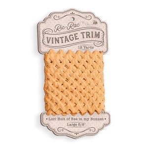 May include: A spool of vintage ric-rac trim in a warm, golden-yellow hue. The trim is labeled "Vintage Trim" and is 12 yards long, with a width of 5/8 inches. The packaging features the text "Lori Holt of Bee in my Bonnet."