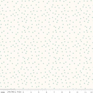 May include: White fabric with a scattered pattern of small teal circles. The fabric is marked with inches from 1 to 12.
