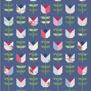 May include: A quilt pattern featuring a repeating design of colorful tulips with green stems on a blue background.