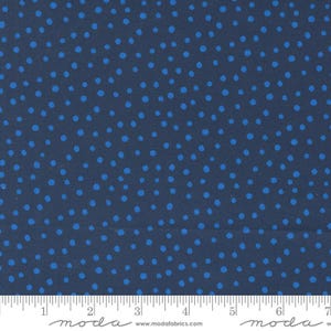 May include: Navy blue fabric with a white polka dot pattern. The dots are small and evenly spaced.