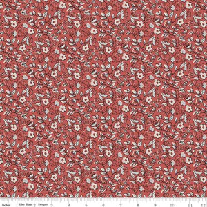 May include: Red fabric with a white and blue floral pattern. The pattern features small flowers and leaves arranged in a diagonal pattern.
