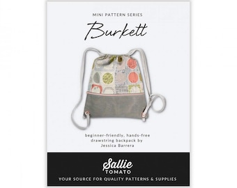 May include: A sewing pattern for a drawstring backpack called "Burkett" by Sallie Tomato. The pattern is beginner-friendly and hands-free. The image shows a colorful, patterned backpack with a gray bottom.
