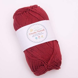 May include: A ball of red 100% cotton yarn labeled "Chunky Thread by Lori Holt of Bee in my Bonnet".