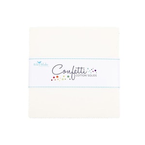 May include: A stack of ivory-colored fabric squares, bound by a white label. The label features the text "Confetti COTTON SOLIDS" in a playful font, with colorful dot accents. The brand name "Riley Blake" is also visible.