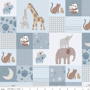 May include: A blue and white fabric with a patchwork design featuring various animals, including giraffes, elephants, koalas, and leopards. The fabric has a subtle star pattern and a repeating pattern of paw prints.