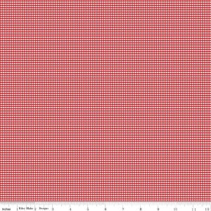 May include: Red and white gingham fabric with a fine checkered pattern. The fabric is shown on a ruler with measurements in inches.