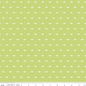 May include: A green fabric with a white repeating pattern of fish. The fabric is 12 inches wide.