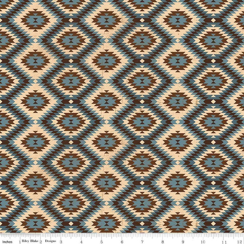 Image of John Wayne American West Southwest Denim quilting cotton fabric by Riley Blake Official Product for Riley Blake Designs. Features diamonds on a blue background. Cute Little Fabric Shop