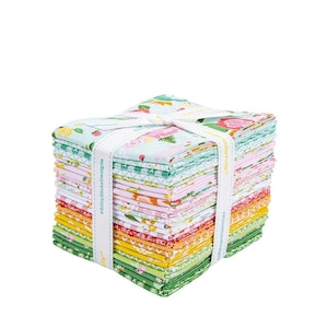 May include: A stack of colorful fabric squares, tied with a white ribbon. The fabric features floral and geometric patterns in shades of pink, green, yellow, and orange. The ribbon has text that reads "#RileyBlakeDesigns".