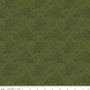 May include: A green fabric with a repeating pattern of dark green stylized floral designs.