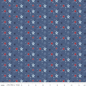 Image of the Stars and Stripes Forever Shooting Stars Blue quilting cotton fabric by Lori Whitlock for Riley Blake Designs. Features stars on a blue background. Cute Little Fabric Shop