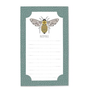 May include: A green notepad with a white border and a bee illustration. The notepad has lined paper and the text "Busy Bee" at the bottom.